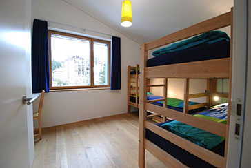 Kinderschlafzimmer der Ferienwohnung Laina am See, Lenzerheide.